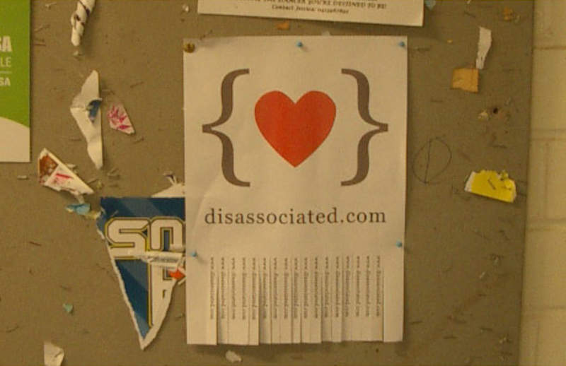 disassociated.com flyer on noticeboard at UNSW